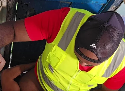 Construction Site Bathroom and Workers