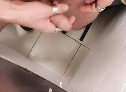 Jerking off a Cock in a Public Toilet